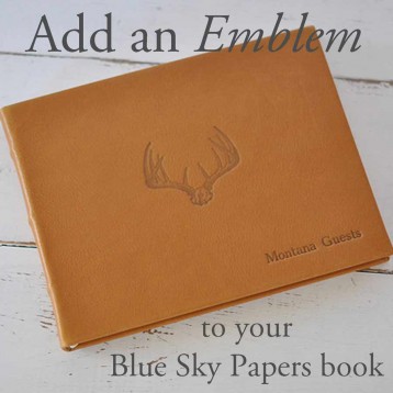 Add an Emblem - Antlers in Blind on the Library Bound Leather Guest Book - by Blue Sky Papers