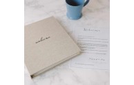 Vacation Home Welcome Binder - Shown in Natural linen with Black embossing- by Blue Sky Papers